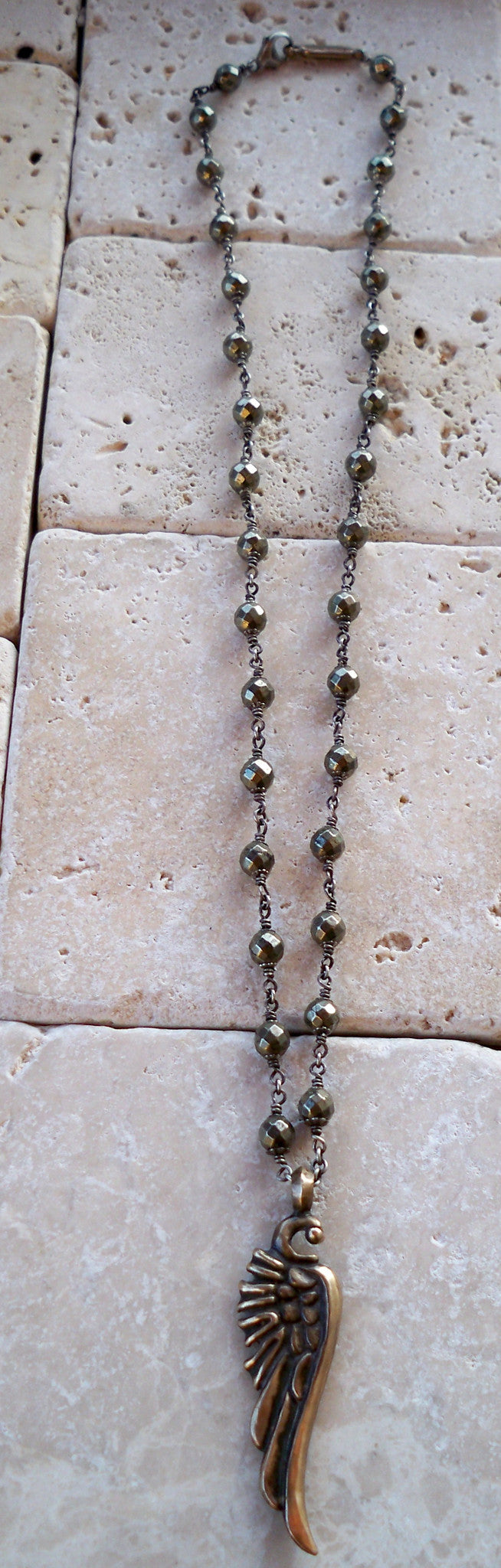 Necklace - Bronze Wing On Sterling Silver