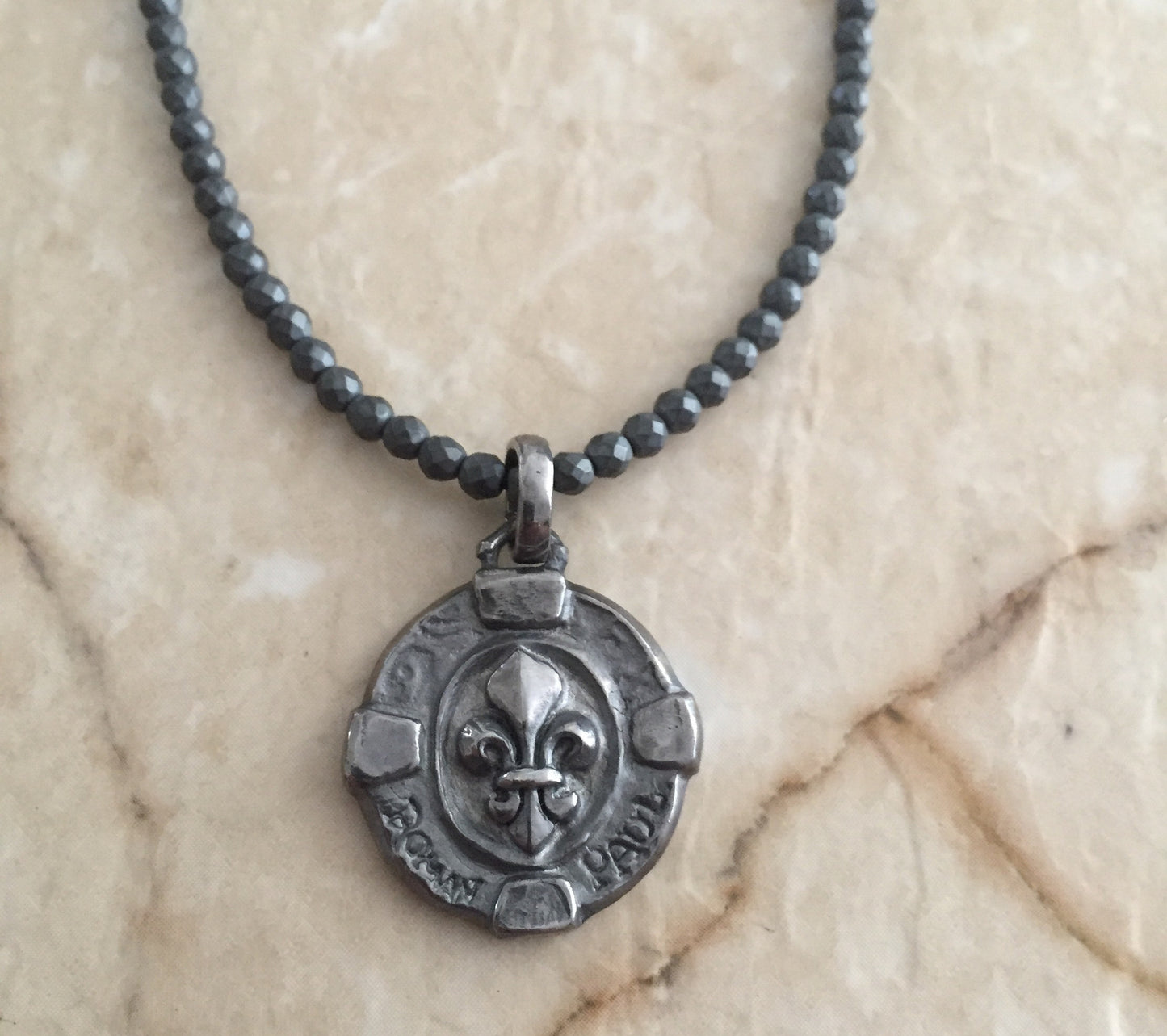 Diamond Cross Medallion & Rubies and fleur de lis in the back