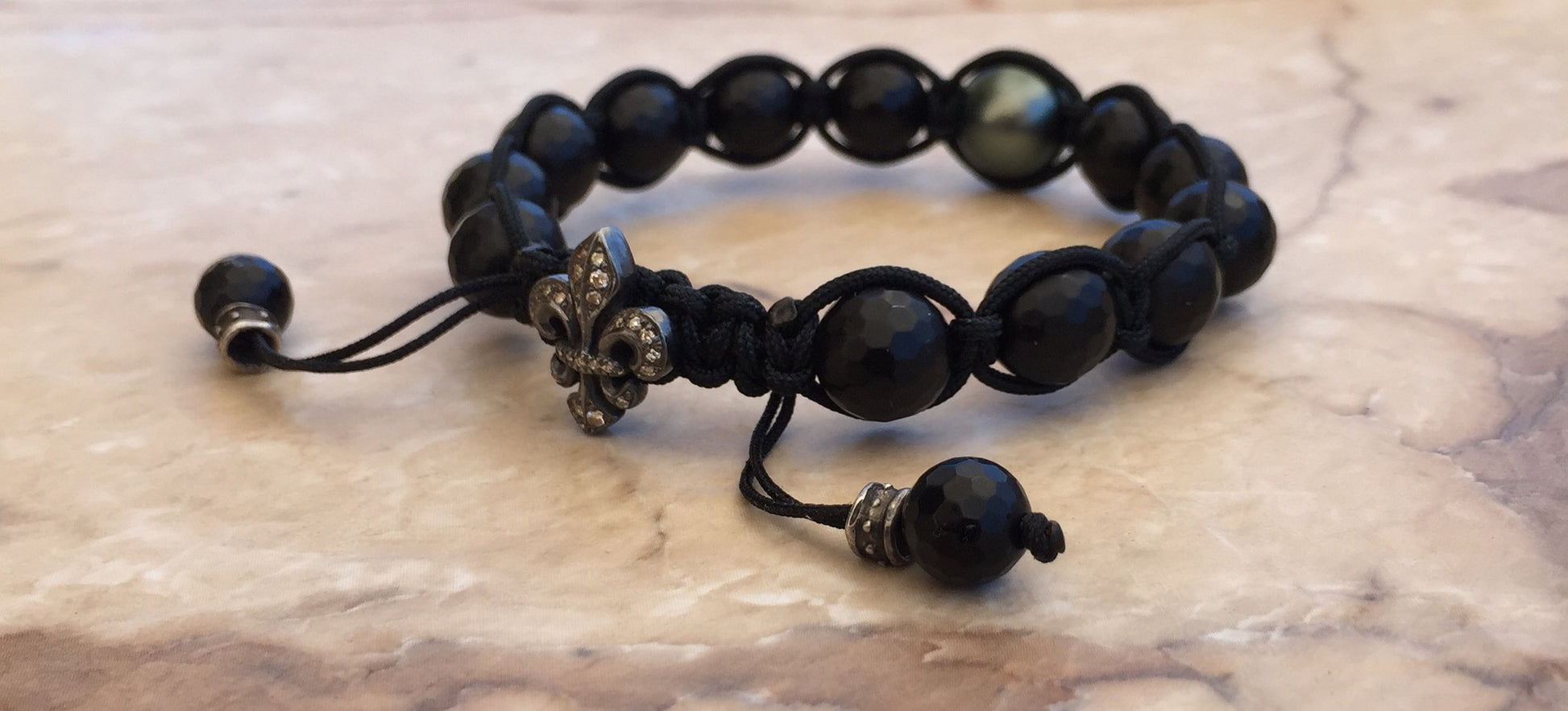 Black Pearl Diamond Fleur De Lis in sterling silver by Roman Paul