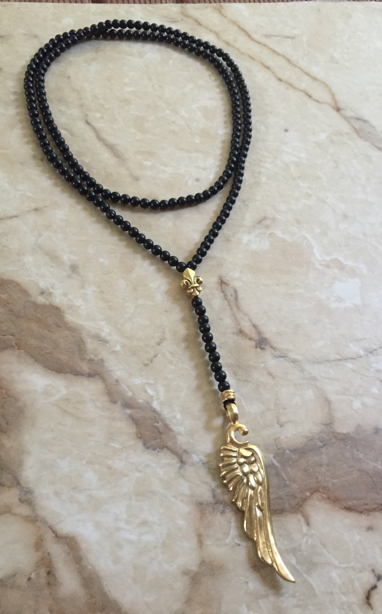 Yellow Gold Plated Wind & Fleur de Lis