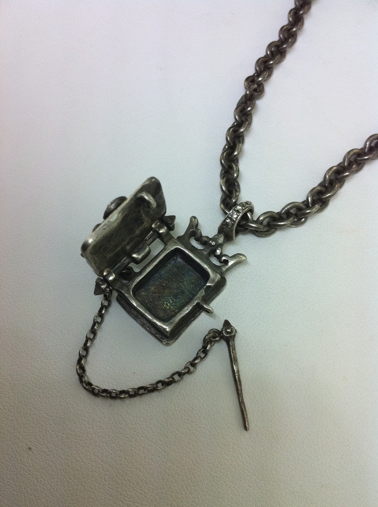 Silver Fleur De Lis Locket Book by  Roman Paul