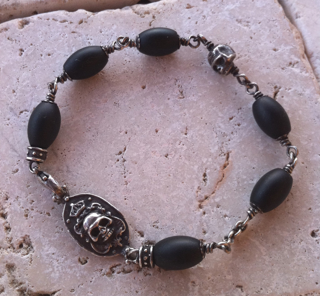 Sterling Silver Two Skull Bracelet with Oval Onyx Beads