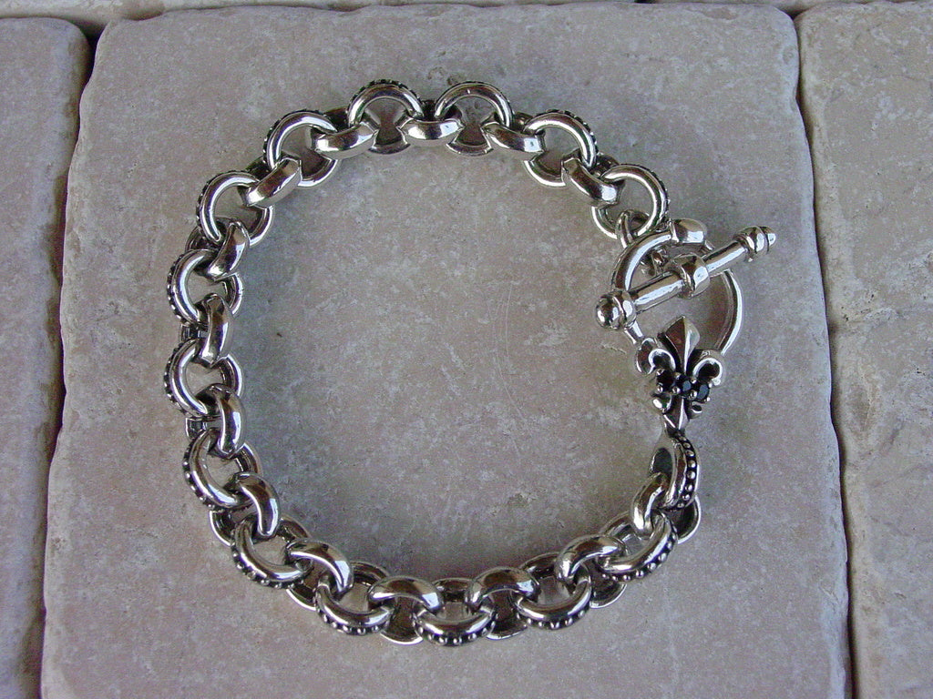 Sterling Silver Fleur De Lis Togle Bracelet With Black Diamonds