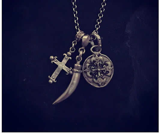 **The Sterling Silver Triple Charm Necklace: A Symbol of Iconic Style and Timeless Elegance**