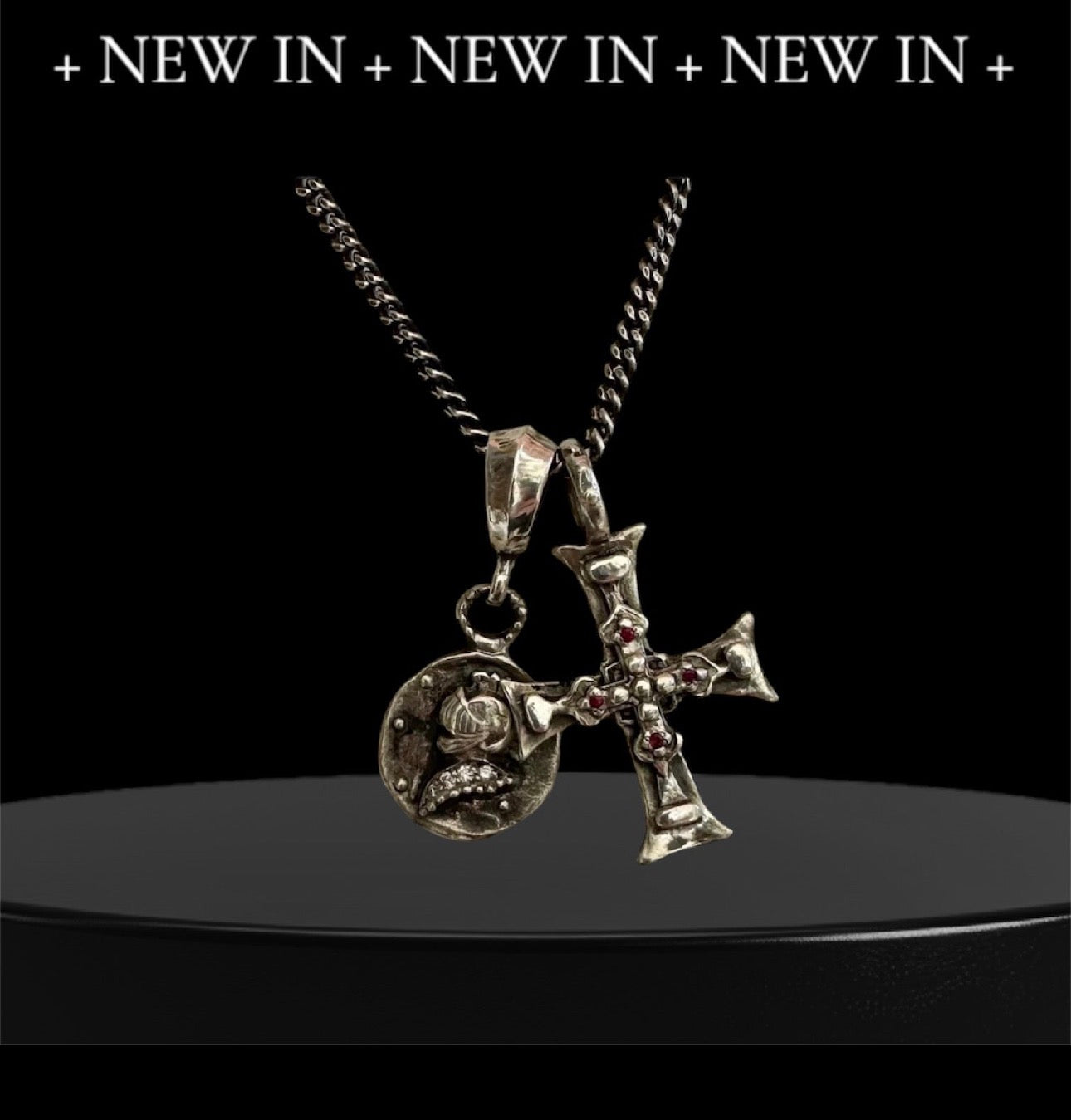 Ancient Cross & Knight Medalion

Sterling Silver Ruby Cross & Diamond Knight Medallion Double Charm Necklace
