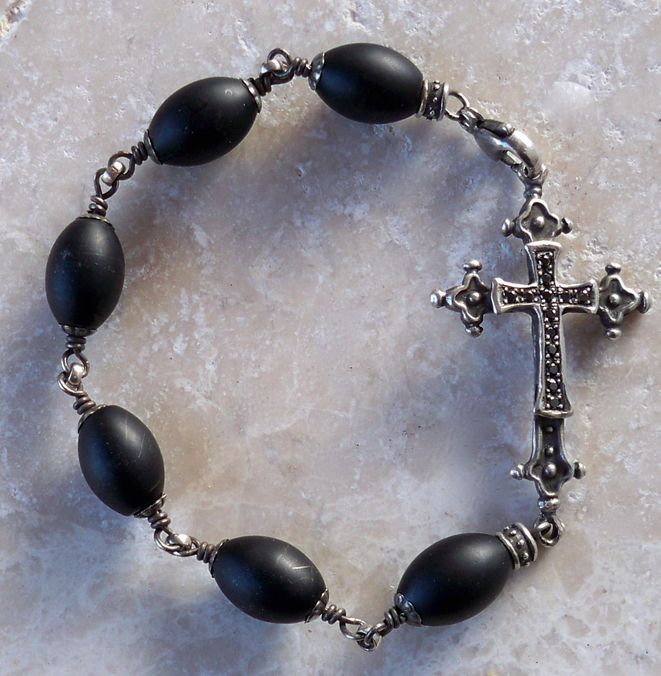 Sterling silver cross with diamonds and rubies - onyx beads