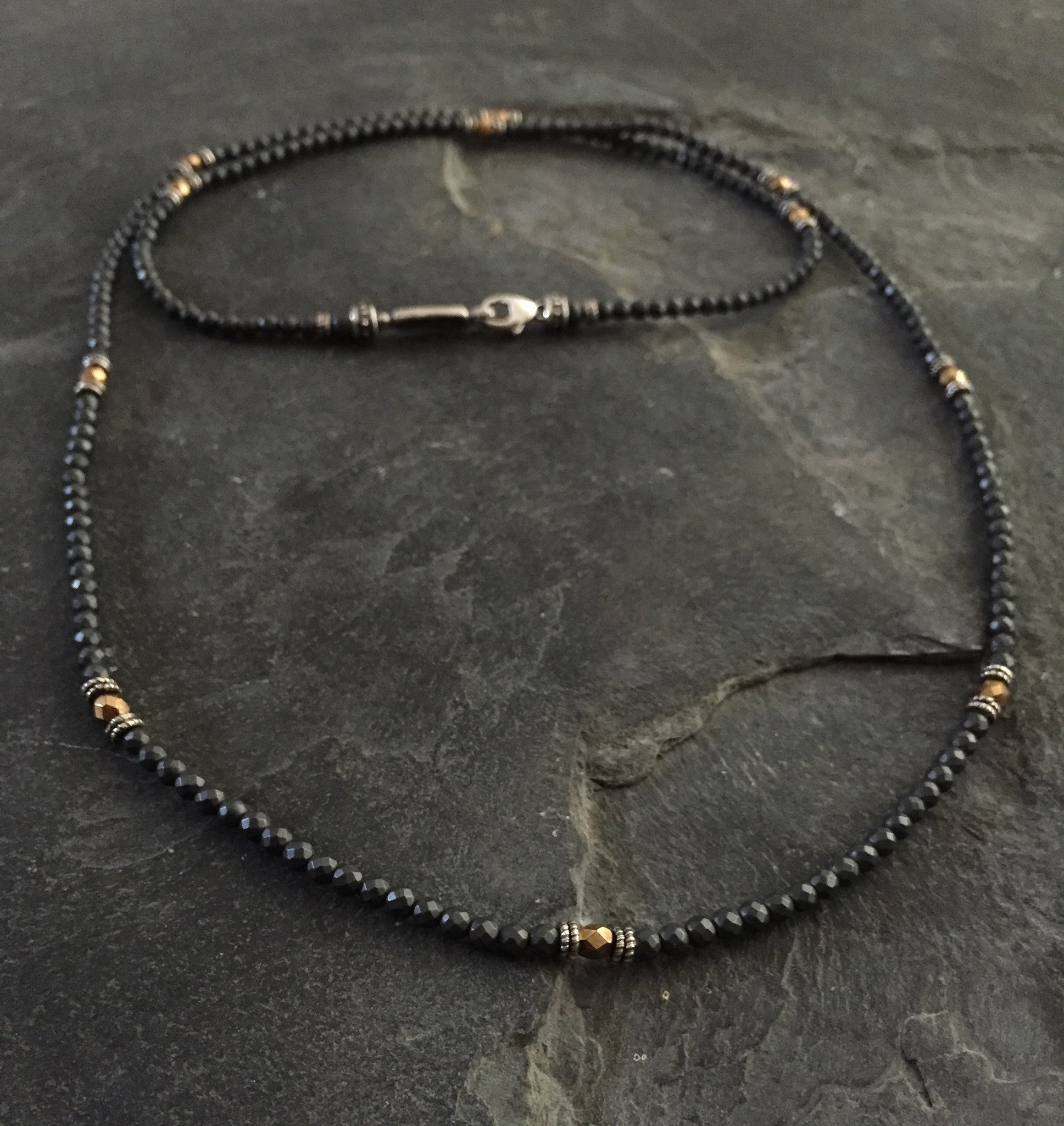 Black onyx and Metal Coated art Beads by Roman Paul