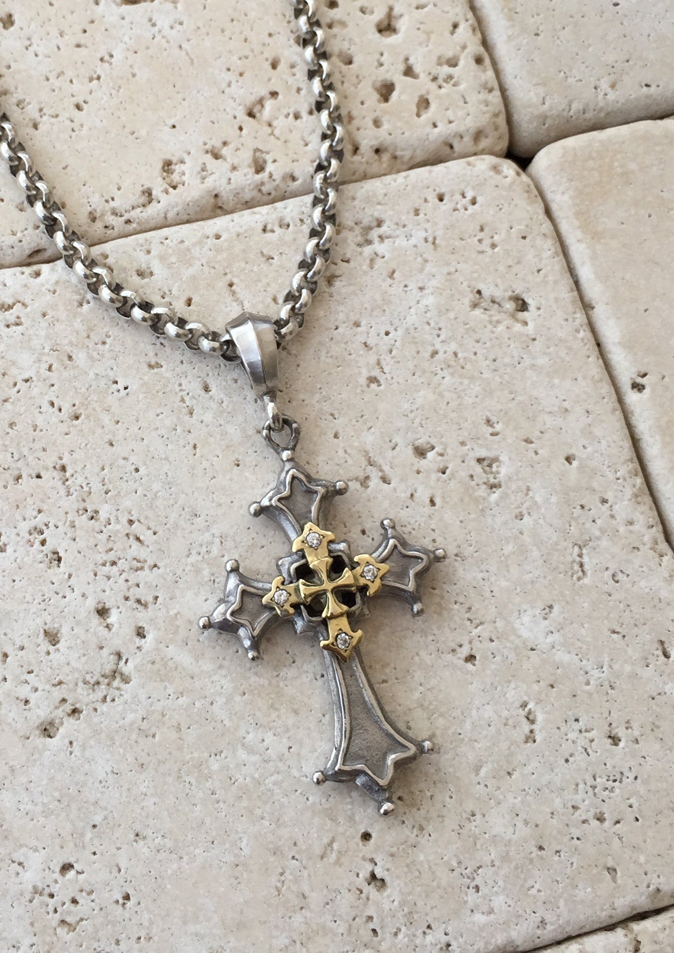 silver necklace with platinum golden gothic cross 