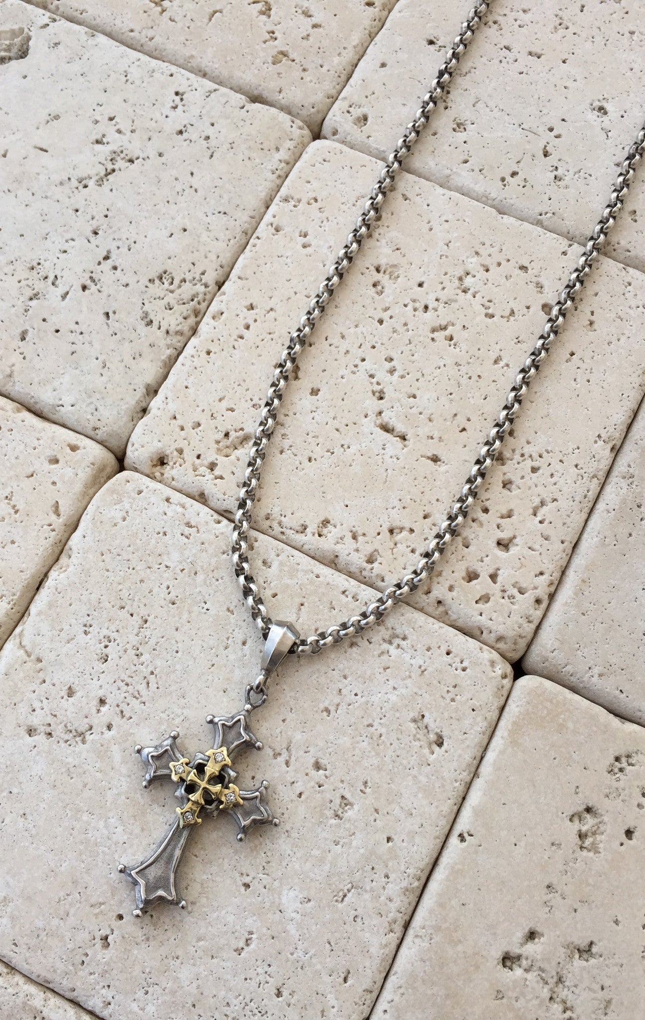silver necklace with platinum plated golden gothic cross 