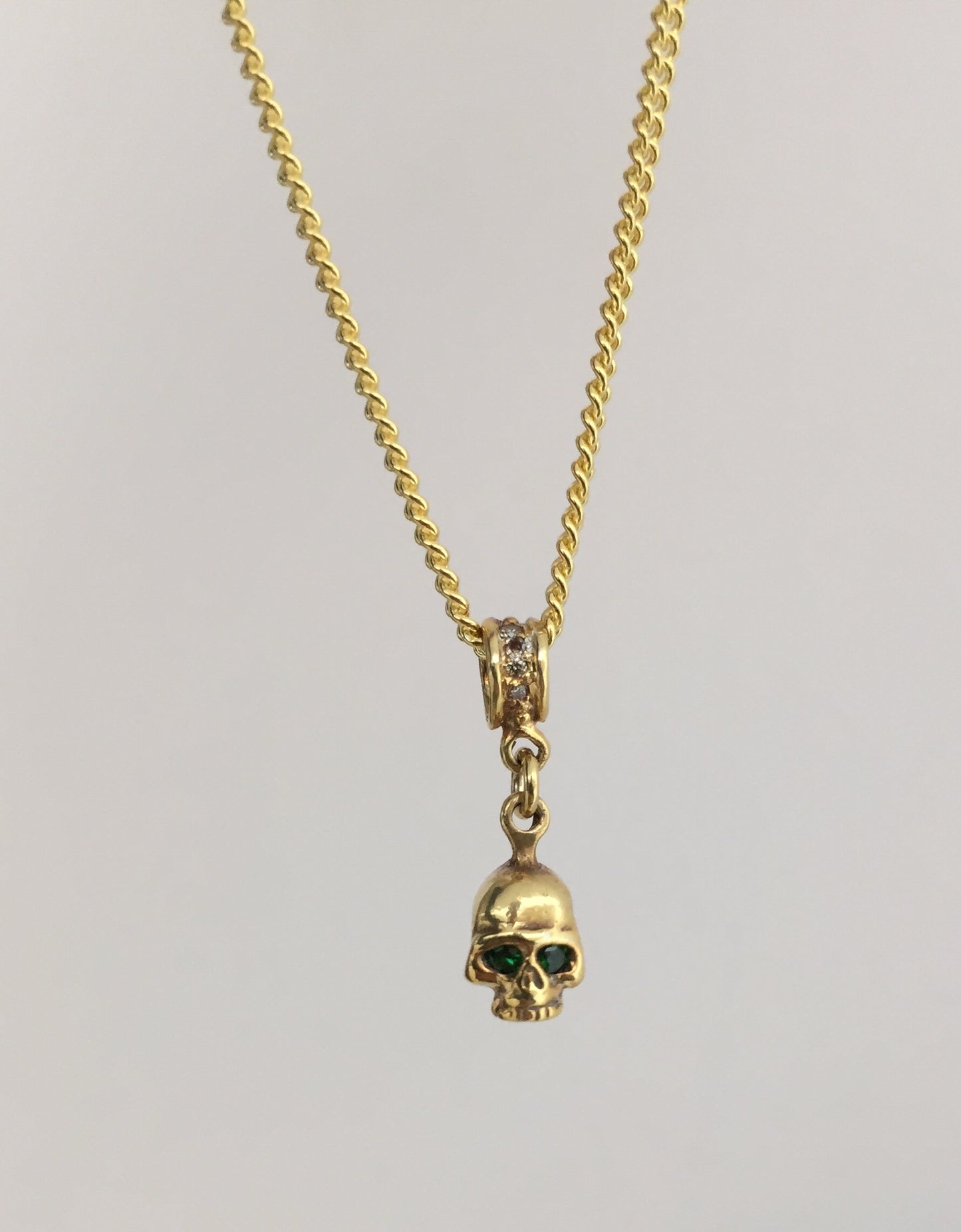 Necklace - Golden Skull with Emeralds in sterling silver by Roman Paul