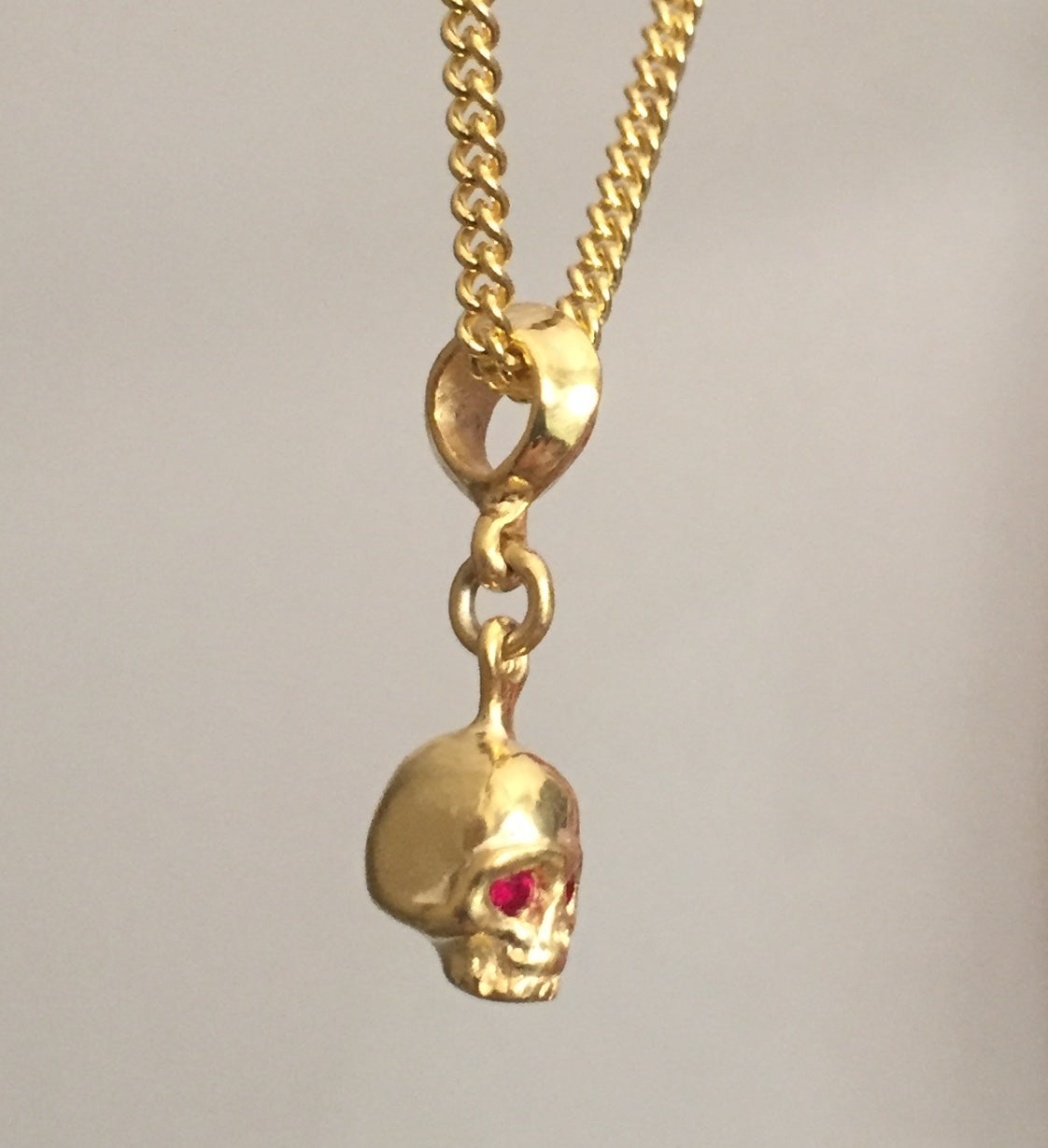 Necklace - Sterling silver Golden Skull w Rubies