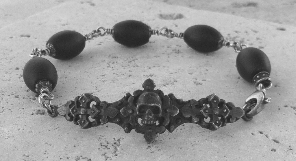 Sterling Silver Dark Antiqued Skull Bracelet with Oval Onyx Beads