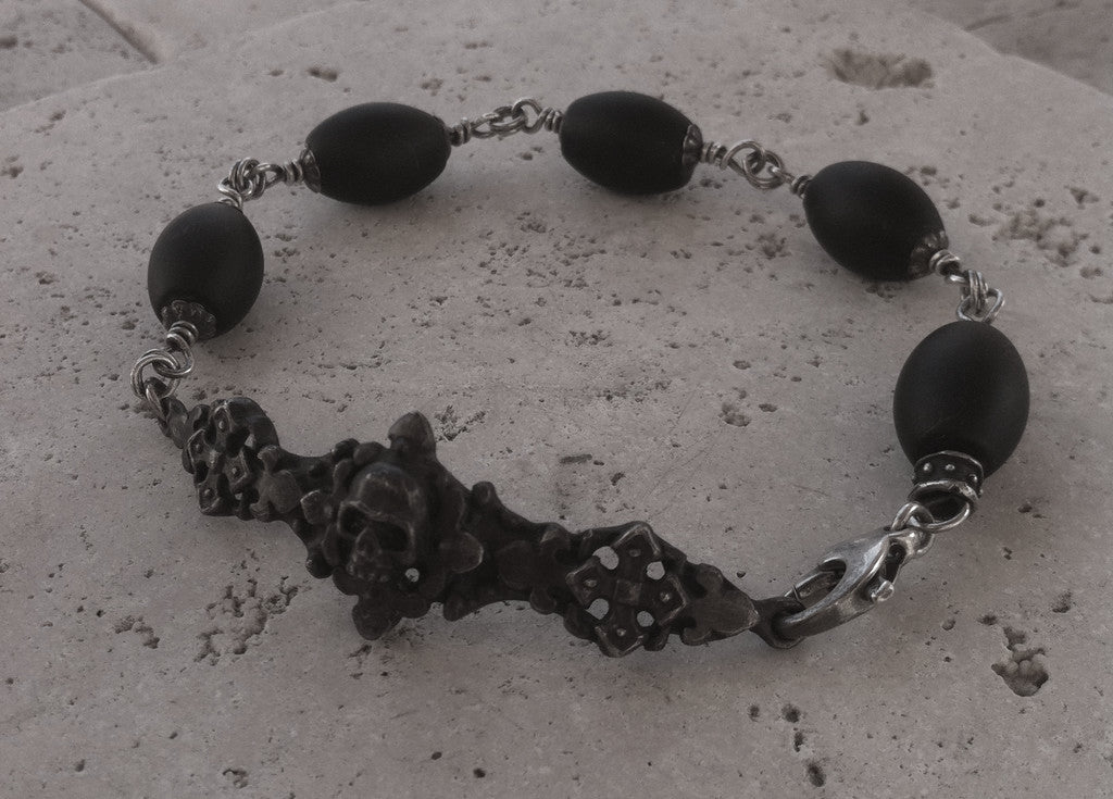 Sterling Silver Dark Antiqued Skull Bracelet with Oval Onyx Beads