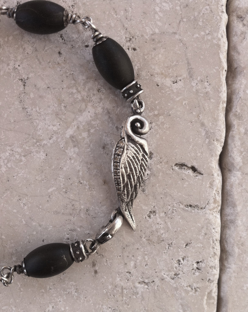 Sterling Silver Wing & Skull with Diamonds and Onyx