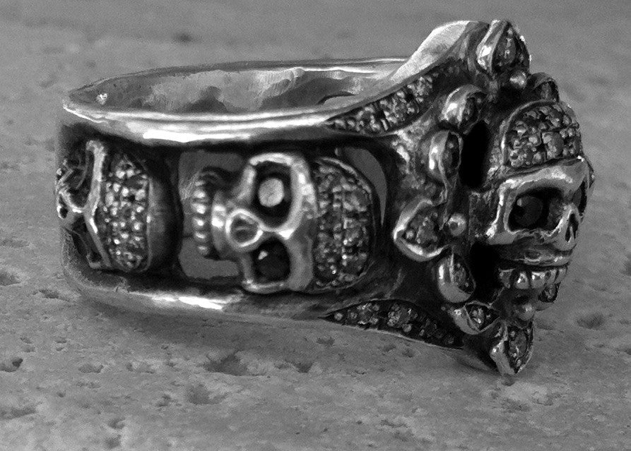 Sterling Silver Five Skull Diamond Pave with Internal Ruby Ring