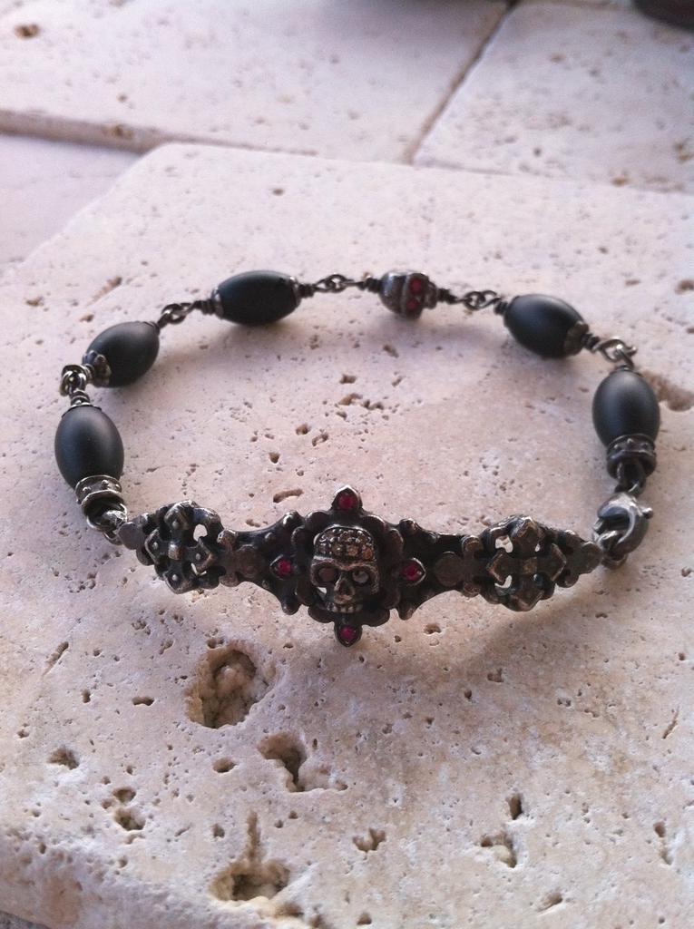 Sterling Silver Dark Antiqued Two Skull Bar Diamond & Ruby Pave Bracelet with Oval Onyx Beads